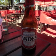 Enjoying a cold Andes beer to cool off